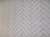 Fotografia de uma parede de azulejos